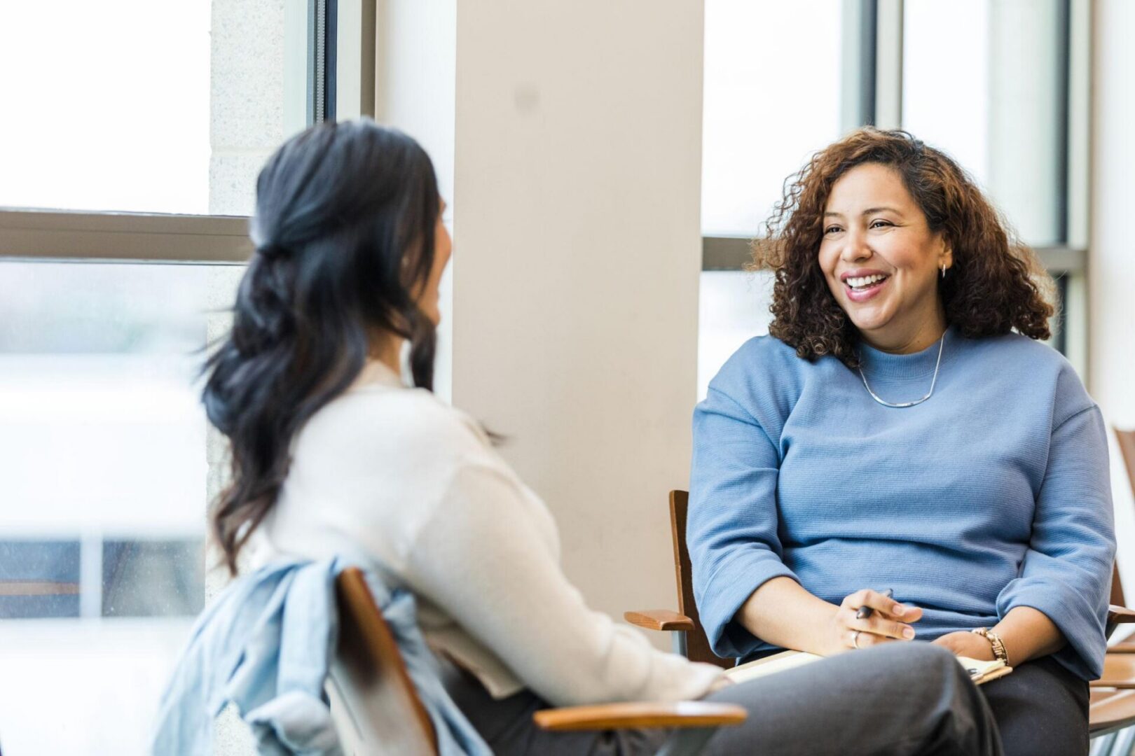 Two women having a friendly conversation.